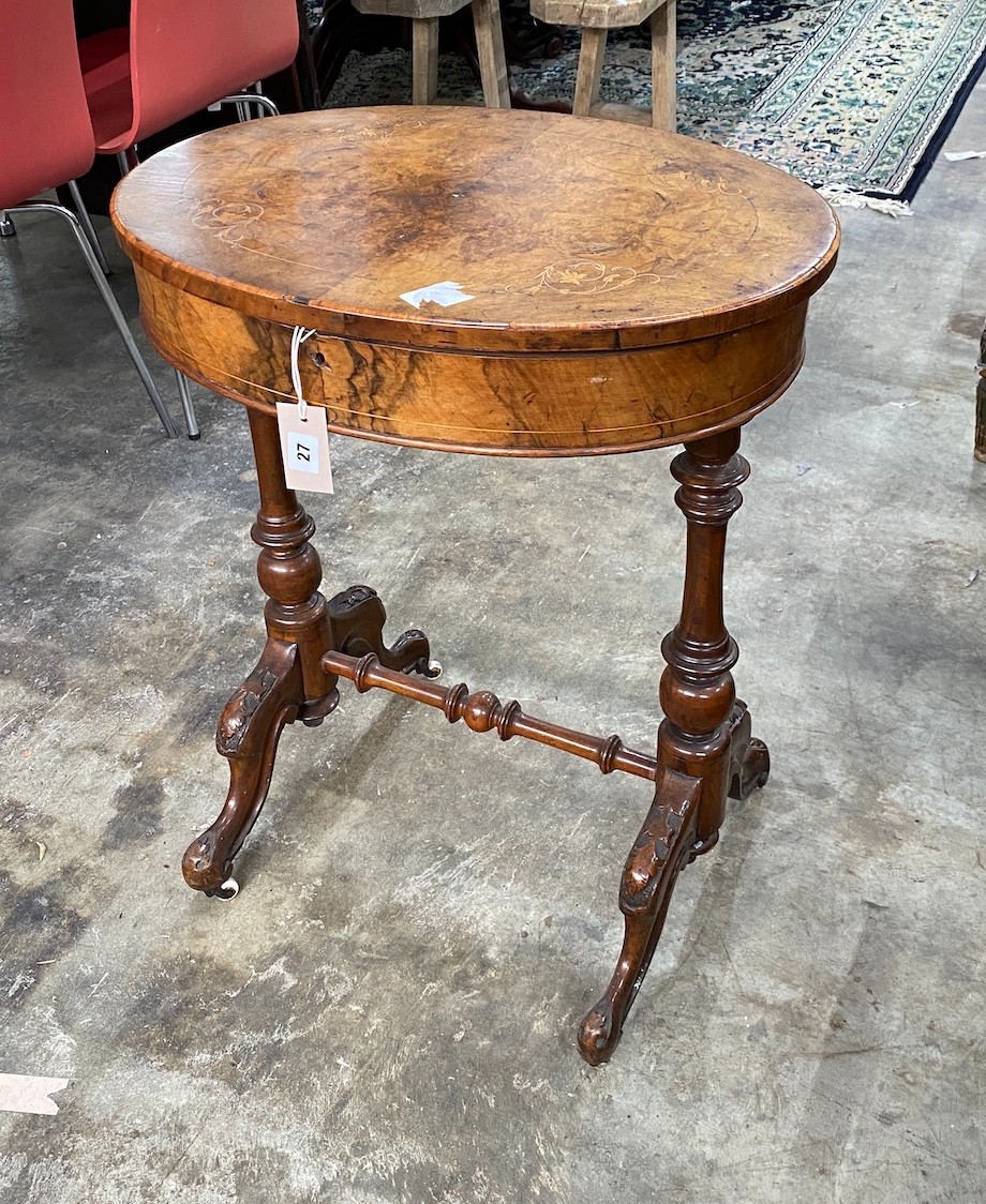 A Victorian oval marquetry inlaid walnut work table (missing basket), width 56cm, depth 42cm, height 71cm